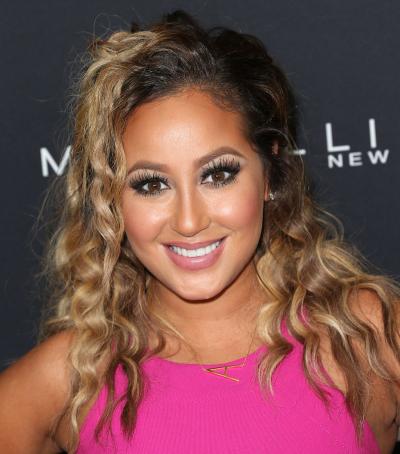 Adrienne Bailon is close to finally removing Rob Kardashian from her life.