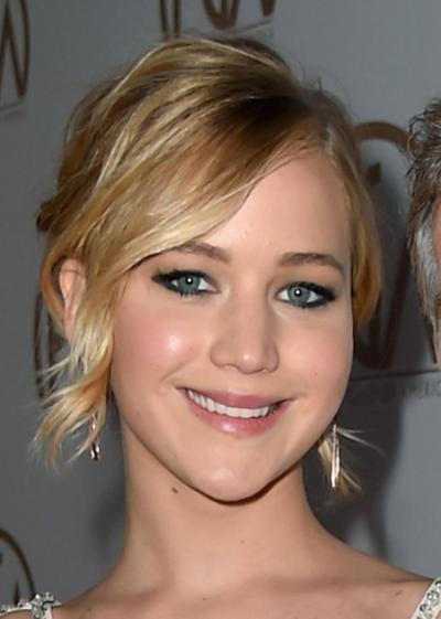 J. Law and guy pal Chris Martin looked "very much in love" in West Hollywood on recent date night.