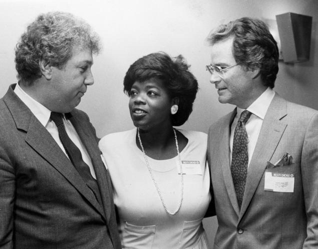 Oprah Winfrey joins Roger King (l.) and Joseph Ahern (r.) former general manager of WLS-TV, in 1985.