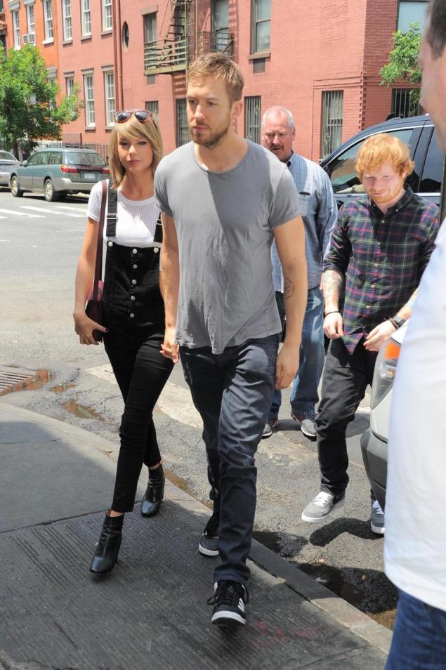 Taylor Swift and Calvin Harris get lunch at the Spotted Pig with Ed Sheeran on May 28, 2015 in New York.