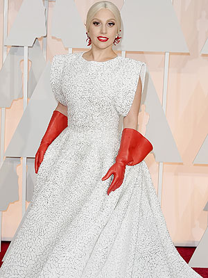 Lady Gaga made washing-up gloves somewhat stylish at the Oscars 2015 [Getty]