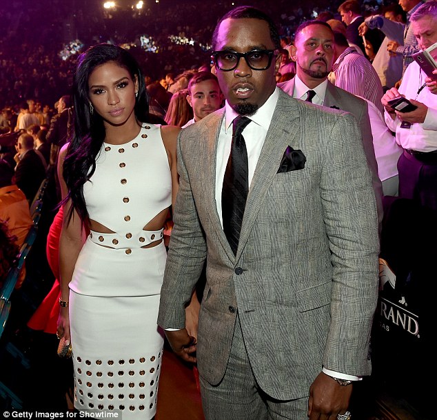 2842376400000578-3065913-Fight_night_Model_Cassie_Ventura_left_and_P_Diddy_pose_ringside_-m-71_1430642104068