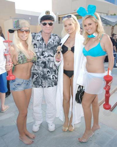Things improved, Madison writes, after the crew of siliconed babes was weaned down to the three featured on 'The Girls Next Door.' Pictured are Kendra Wilkinson, Hugh Hefner, Holly Madison and Bridget Marquardt.