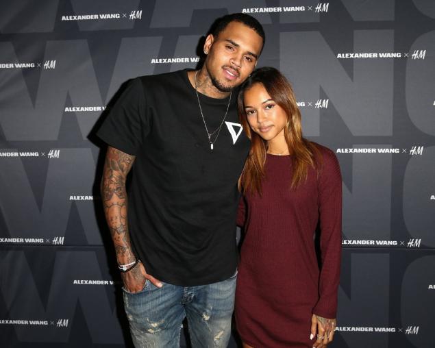 Recording artist Chris Brown (L) and model Karrueche Tran attend the Alexander Wang x H&M Pre-Shop Party at H&M on November 5, 2014.