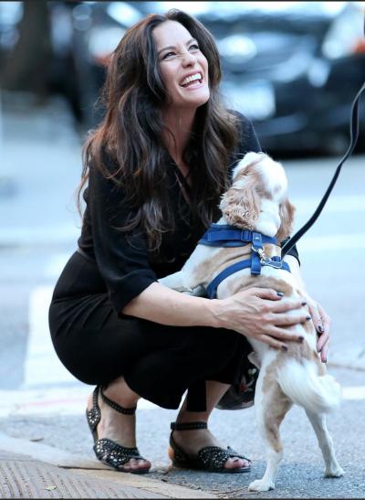 Liv Tyler gets a big welcome from her pooch Neal in New York after returning from San Francisco.