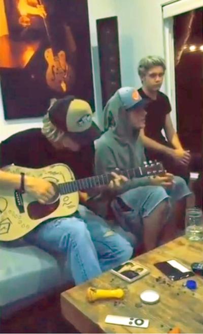 Niall Horan, Justin Bieber and Cody Simpson jam in Los Angeles over the weekend - with a suspicious pipe visible on the table.