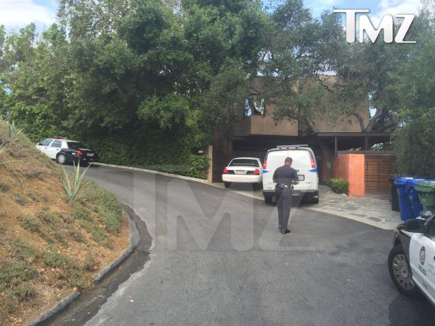 Police at Demi Moore's Beverly Hills home on Sunday. 