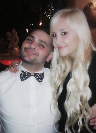 Amanda Bynes returned online in style, in a gown by Michael Costello (l.).
