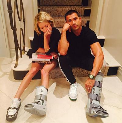 Mark Consuelos shared this image of him and his wife Kelly Ripa both wearing boots on their feet. Consuelos has a small calf tear and Ripa has a broken foot.