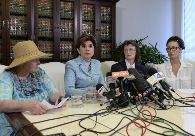 Attorney Gloria Allred (2nd l.) speaks during a news conference Wednesday in Los Angeles with three women accusing Bill Cosby of sexual assault: Colleen Hughes (l.), Linda Ridgeway Whitedeer (2nd r.) and actress Eden Tirl (r.).