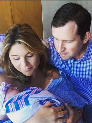 Jenna and Henry cradle their new baby girl [Jenna Bush Hager/Instagram]