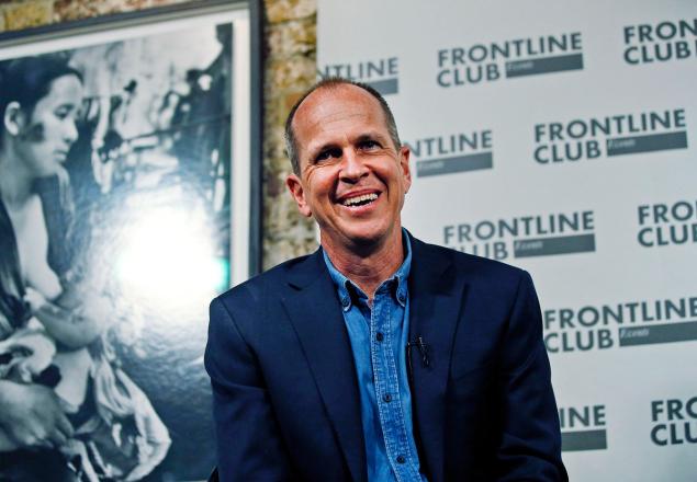 Freed Al-Jazeera journalist Peter Greste smiles as he answers a question during an event in central London, Thursday, Feb. 19, 2015.