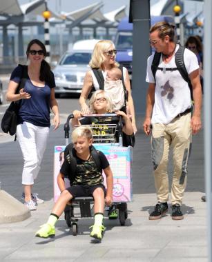 Gwen Stefani, Gavin Rossdale and their family pictured at Heathrow Airport on July 24, 2014 in London, England.