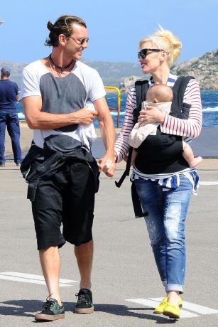 Gwen Stefani and Gavin Rossdale are full of smiles as they arrive in Sardinia for a relaxing family vacation July 30, 2014.