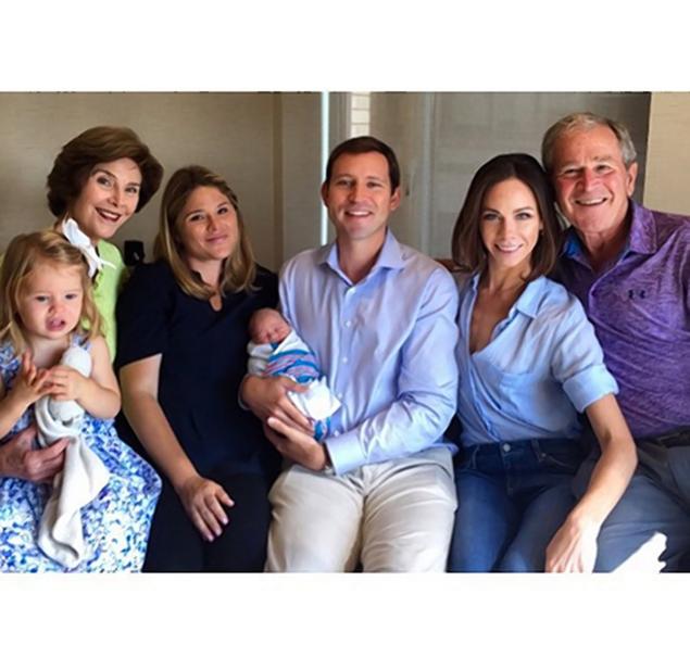 Laura Bush (l.) shared the first family photo to feature her newborn granddaughter Poppy Louise.