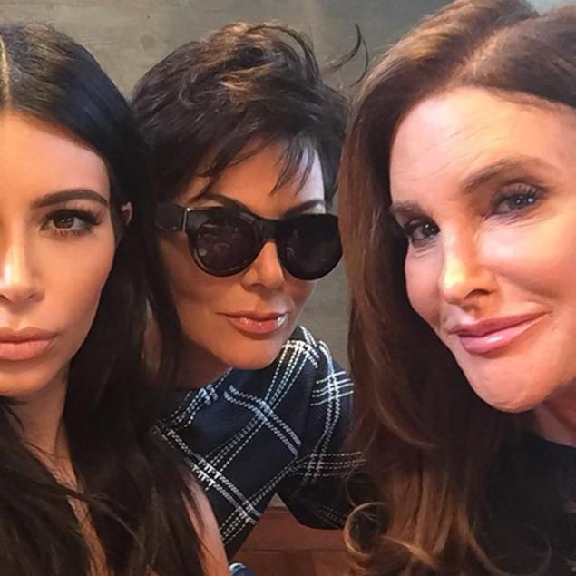 Exes Kris (center) and Caitlyn (right) Jenner pose for their first photo together since Caitlyn's transition, which daughter Kim Kardashian posted on Instagram with the caption: "The parent trap."