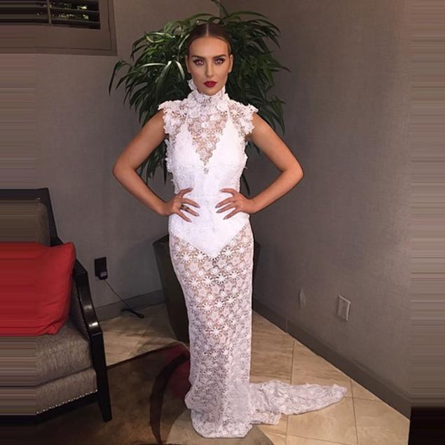 Perrie Edwards posted this photo of her in an elegant, bridal-style dress just one day after news broke that her engagement to Zayn Malik had ended.