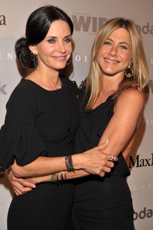 Courteney Cox (l.) was reportedly the maid of honor at Jennifer Aniston’s wedding.