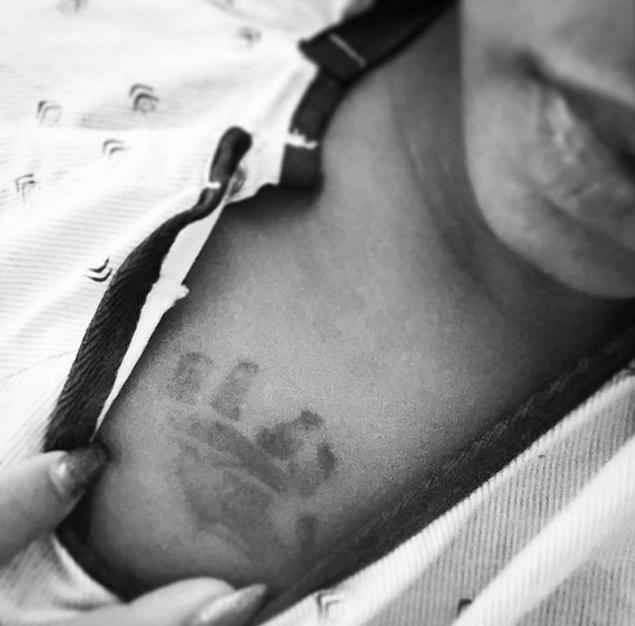 Danielle Milian shared this image on Instagram her instagram which appears to be her son's hand print.
