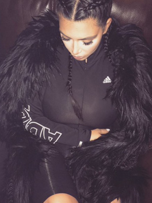 Kim Kardashian shows off post baby body in Kanye West's studio [Kim Kardashian/Twitter]