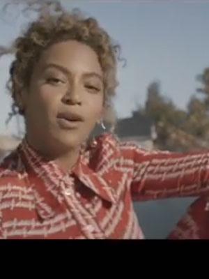 Beyonce in her music video [Beyonce]